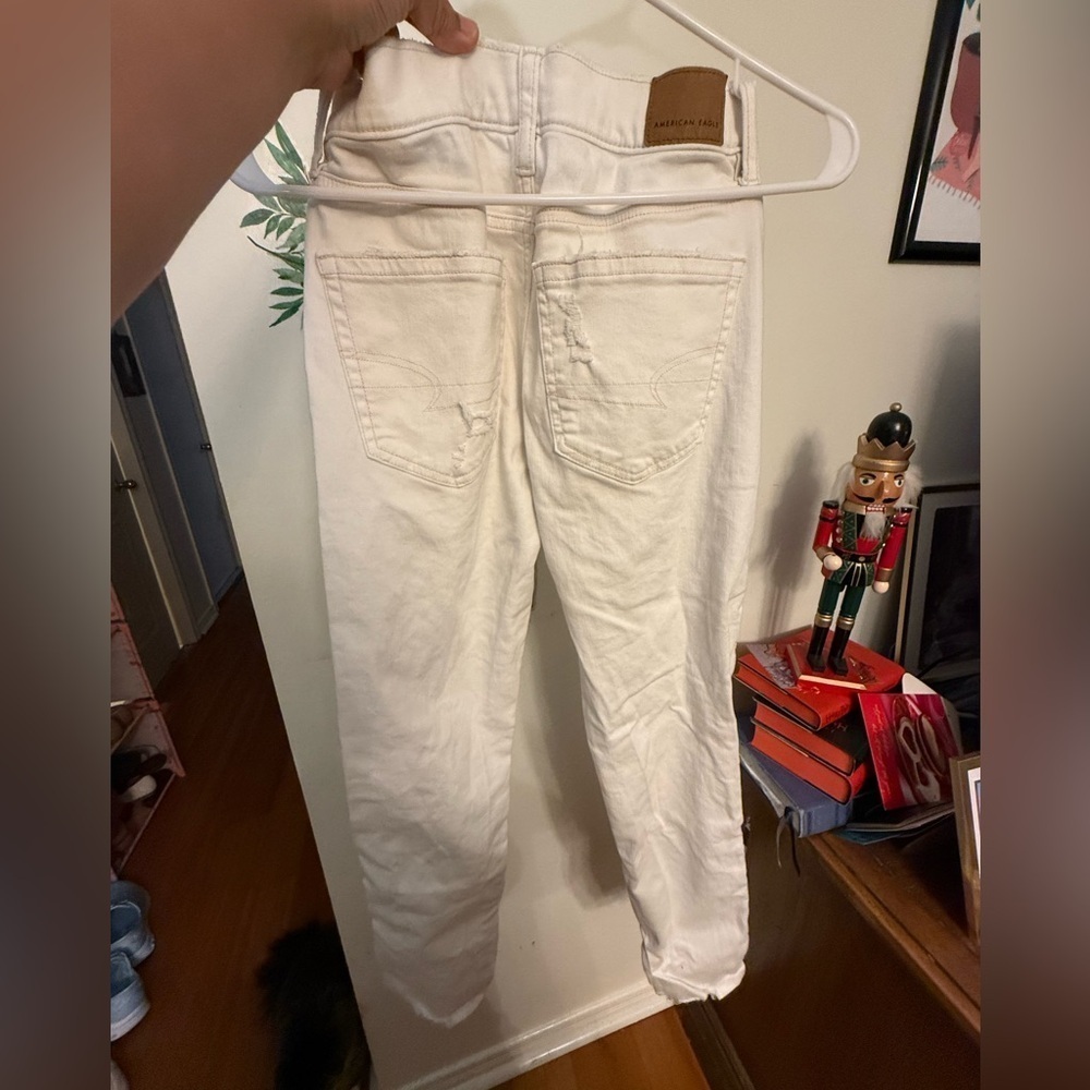 American Eagle Outfitters Cream Ripped Jeans